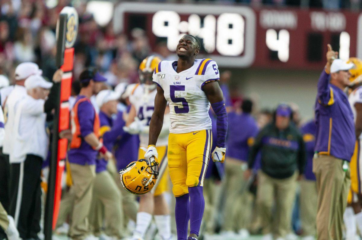 LSU junior safety Kary Vincent Jr. (5) celebrates after a stop during the Tigers' 46-41 victory over Alabama in Bryant-Denny Stadium on Saturday, Nov. 9, 2019.