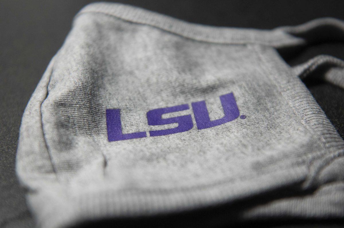 An LSU mask on a desk on Tuesday, Aug. 25, 2020 in West Campus Apartments.