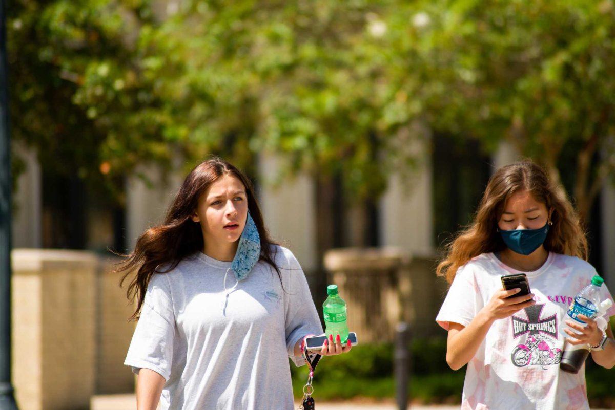 LSU students walk on Monday, Aug. 17, 2020 in front of East Laville Hall on South Campus Dr.&#160;