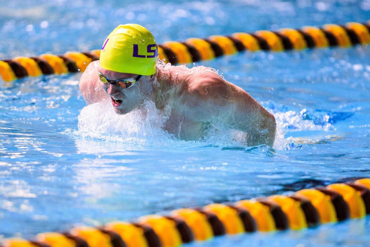 Lewis Clough competes in a swim meet.