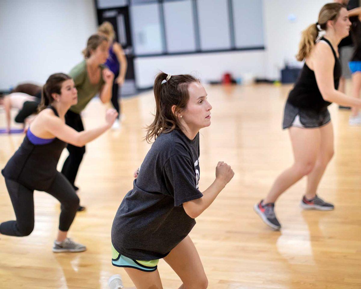 Students&#160;exercise in a GroupX class at the UREC.&#160;