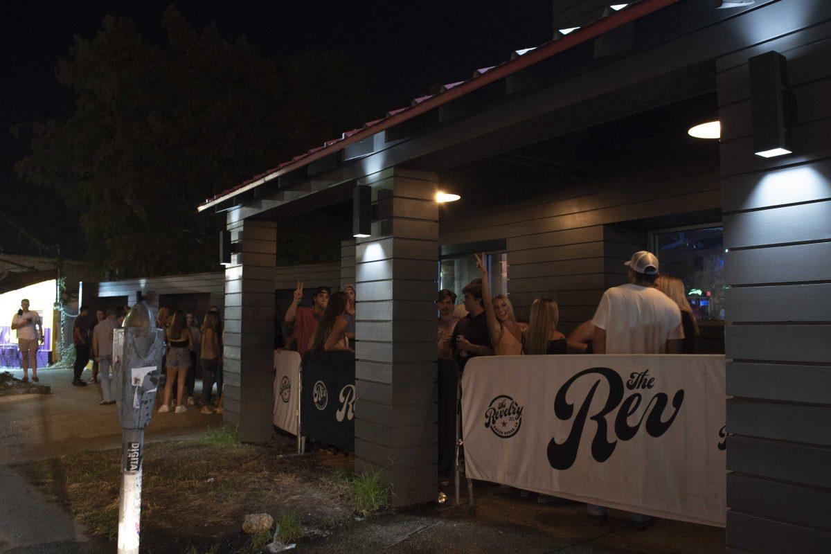 People wait in line to enter the bar on Friday, Sept. 11, 2020 at The Revelry on Highland Rd.