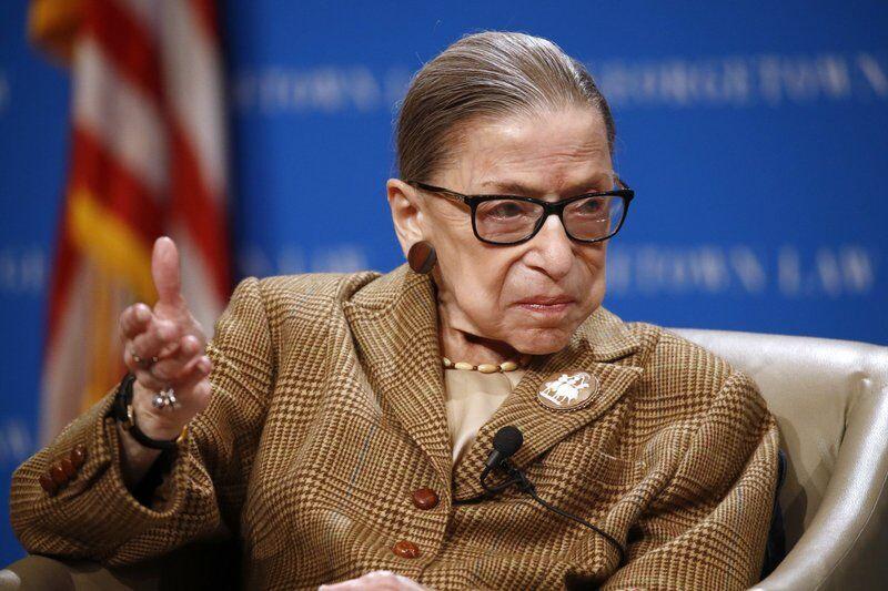 In this Feb. 10, 2020, file photo U.S. Supreme Court Associate Justice Ruth Bader Ginsburg speaks during a discussion on the 100th anniversary of the ratification of the 19th Amendment at Georgetown University Law Center in Washington.