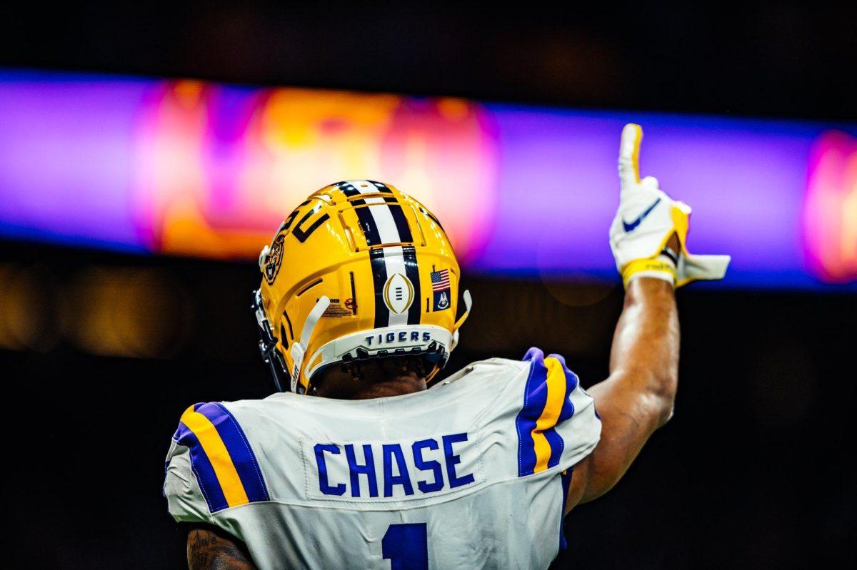 LSU sophomore wide receiver Ja'marr Chase (1) holds up the number one Monday, Jan. 13 2020 during LSU's 42-25 win against Clemson during the National Championship in the Mercedes-Benz Superdome.