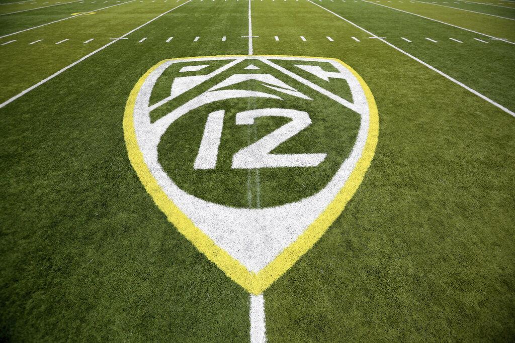 FILE- In this Oct. 10, 2015, file photo, a PAC-12 logo is displayed on the field before an NCAA college football game between Washington State and Oregon in Eugene, Ore. The Pac-12 university presidents and chancellors will meet Friday, Sept. 17, 2020, and be presented options for staging a fall football season, but Commissioner Larry Scott says a vote by the the CEO Group is not expected.&#160;