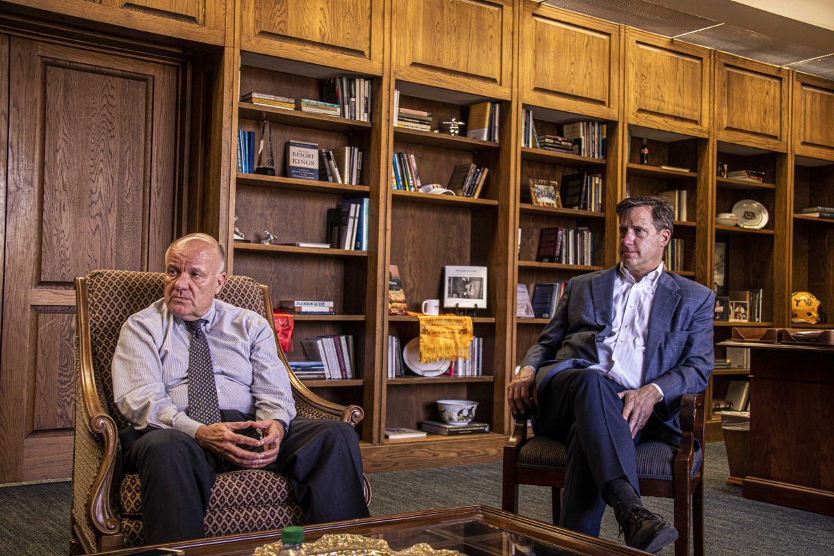 Pictured from left to right: LSU's Interim President, Tom Galligan listens to a question while LSU's Vice President for Strategic Communications, Jim Sabourin observes on Monday, Feb. 3, 2020 in an interview with Galligan in his office at the University Administration building on LSU's campus.