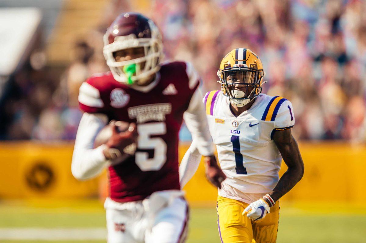 LSU football freshman cornerback Eli Ricks (1) tries to catch up to Mississippi State football senior wide receiver Osirus Mitchell (5) Saturday, Sep. 26, 2020 during LSU's 44-24 loss against Mississippi State in Tiger Stadium.