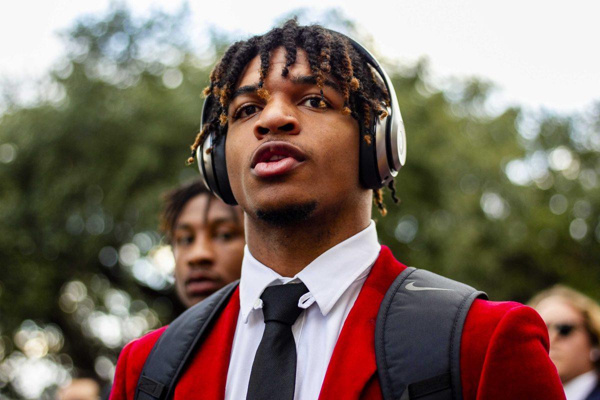 LSU sophomore wide receiver Ja'Marr Chase (01) walks down Victory Hill on Saturday, Nov. 30, 2019.