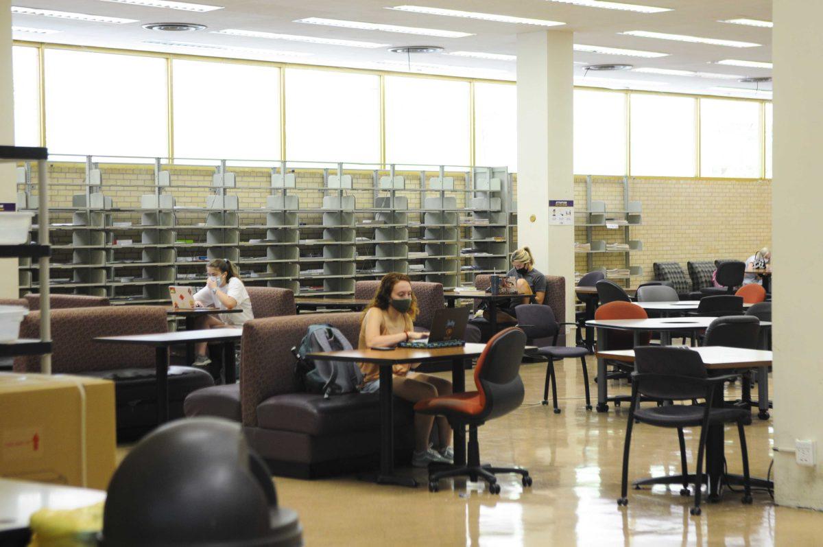 LSU students sit six feet apart Friday, Sept. 4, 2020, in the LSU Library.