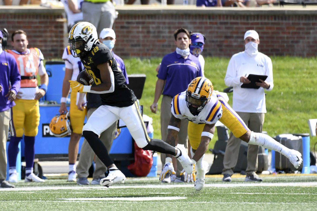 Missouri wide receiver Chance Luper (18) runs past LSU cornerback Derek Stingley Jr. during the second half of an NCAA college football game Saturday, Oct. 10, 2020, in Columbia, Mo. Missouri upset LSU 45-41. (AP Photo/L.G. Patterson)