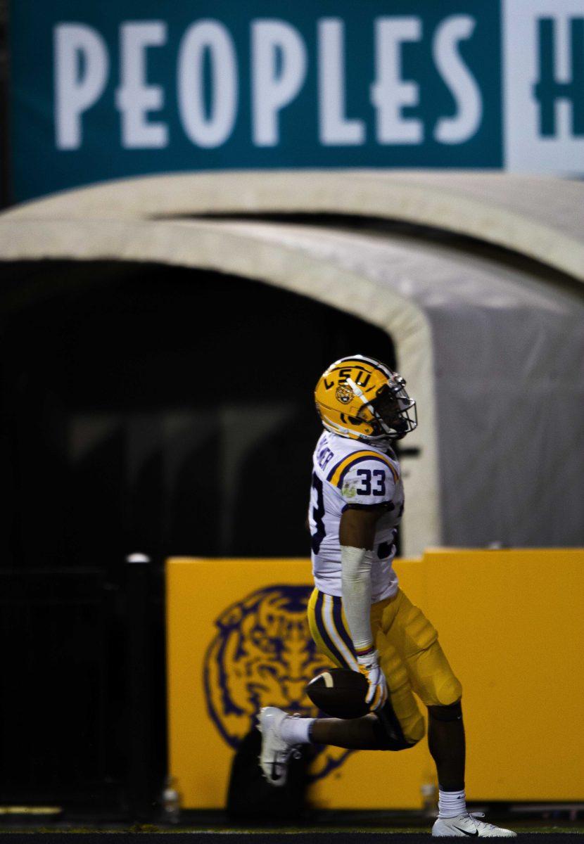 LSU football sophomore wide receiver Trey Palmer (33) runs the ball back to score a touchdown Saturday, Oct. 24, 2020 during LSU's 52-24 win against South Carolina in Tiger Stadium.