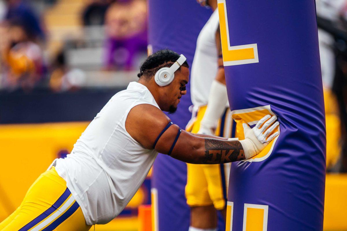 LSU football sophomore nose tackle Siaki Ika (62) practices Saturday, Sep. 26, 2020 before LSU's 44-24 loss against Mississippi State in Tiger Stadium.