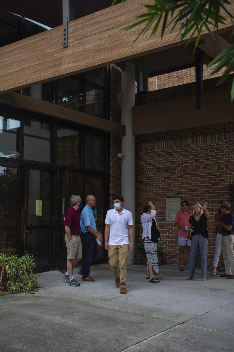 A group of people leave mass on Saturday, September 12, 2020 at Christ the King Church on LSU's campus.