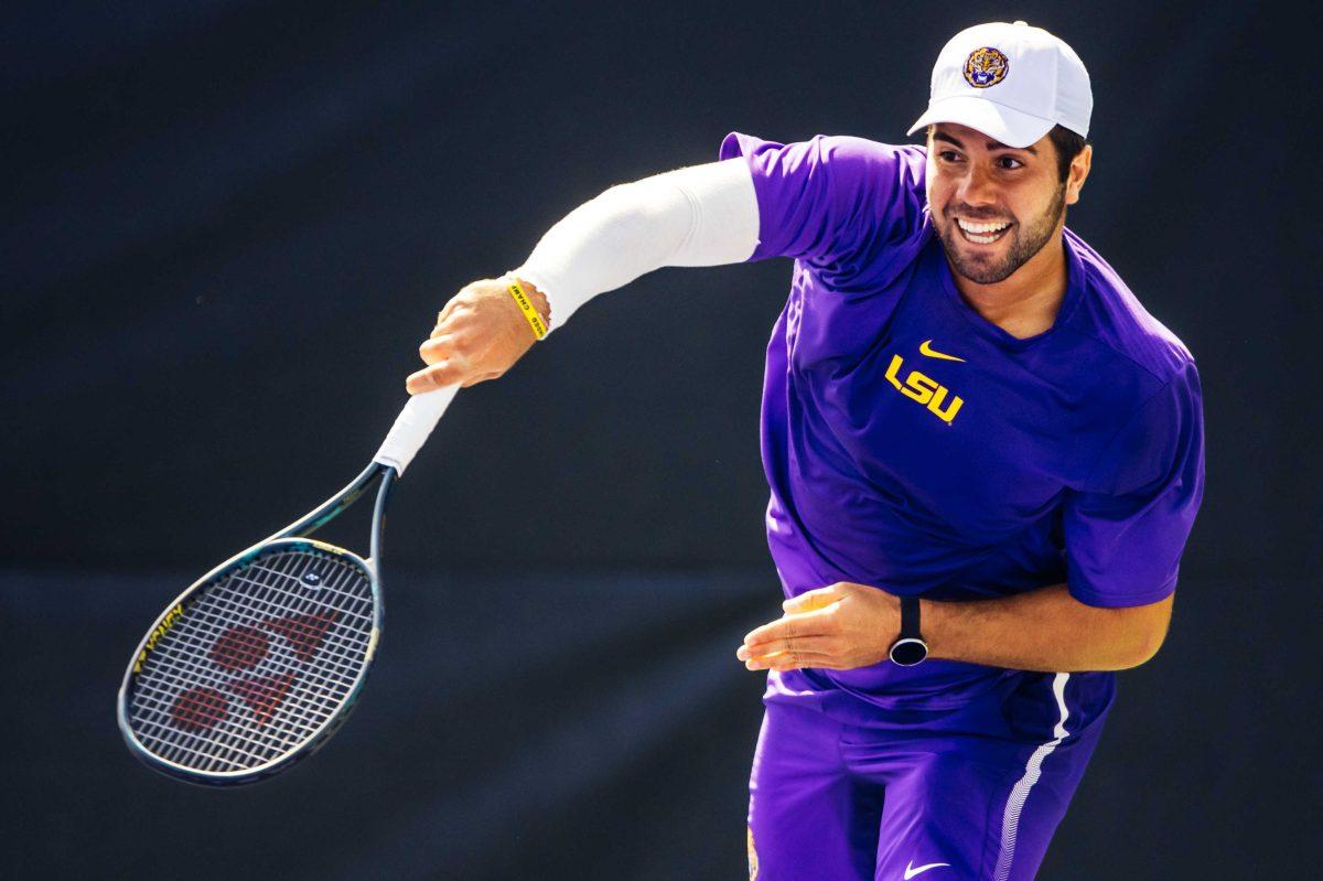 LSU men's tennis senior Rafael Wagner serves Saturday, Oct. 3, 2020 during his and sophomore Ronald Hohmann's 8-5 win in the second match on the second day of the Olivier Borsos Invitational in the LSU Tennis Complex on Gourrier Avenue.