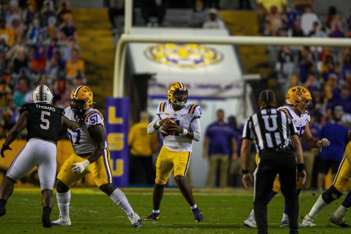 LSU football freshman quarterback TJ Finley (11) looks for an open receiver Saturday, Oct. 24, 2020 during LSU's 52-24 win against South Carolina in Tiger Stadium.