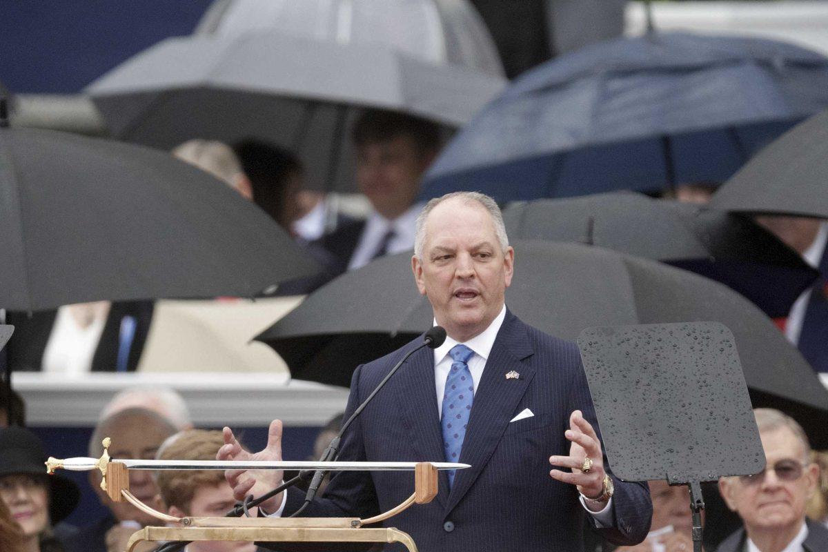 FILE- In this Jan. 13, 2020 file photo, Louisiana Gov. John Bel Edwards speaks during his inauguration at the state Capitol in Baton Rouge, La. Gov. Edwards said Wednesday, Feb. 26, 2020, that Louisiana judge should step down after she admitted to using racial slurs in angry text messages. The Democratic governor said the "state deserves better. (AP Photo/Brett Duke, File)