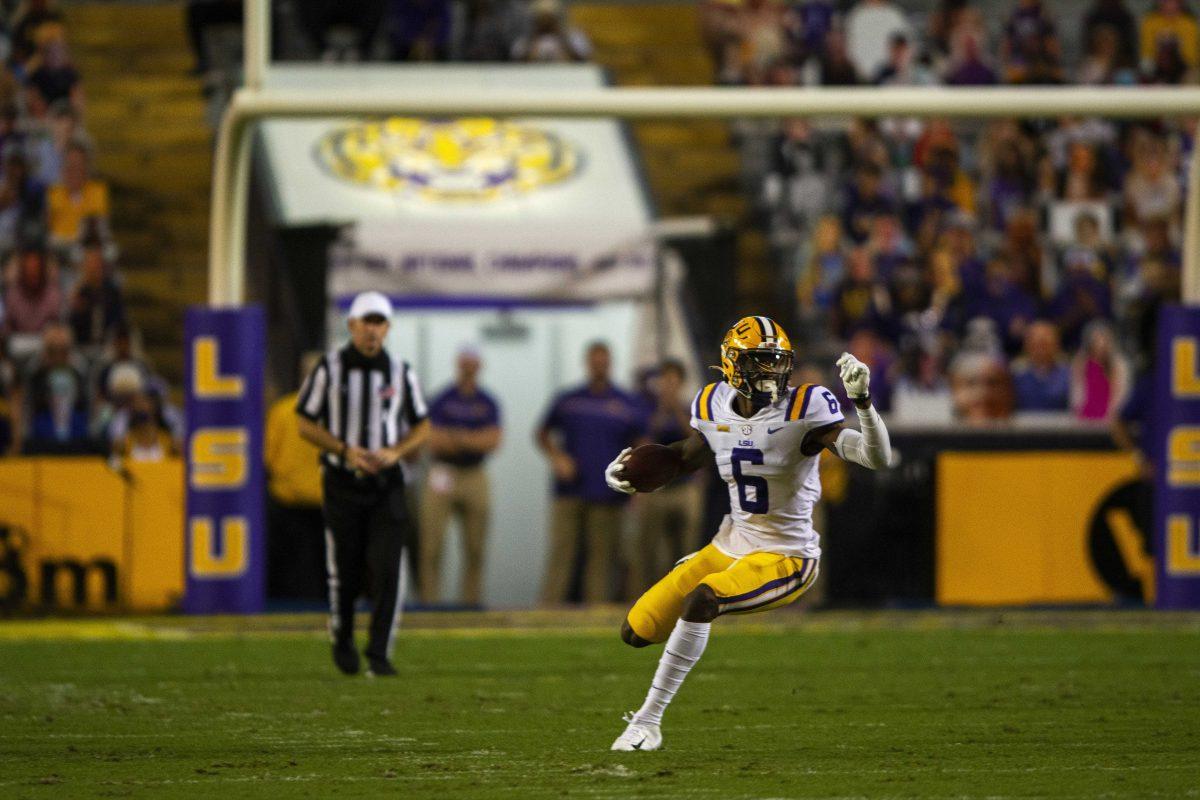 LSU football junior wide receiver Terrace Marshall Jr. (6) runs the ball Saturday, Oct. 24, 2020 during LSU's 52-24 win against South Carolina in Tiger Stadium.