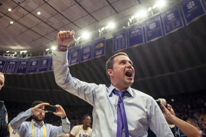 LSU coach Will Wade celebrates after the Tigers 82-80 victory over Tennesse on Saturday, Feb. 23, 2019.