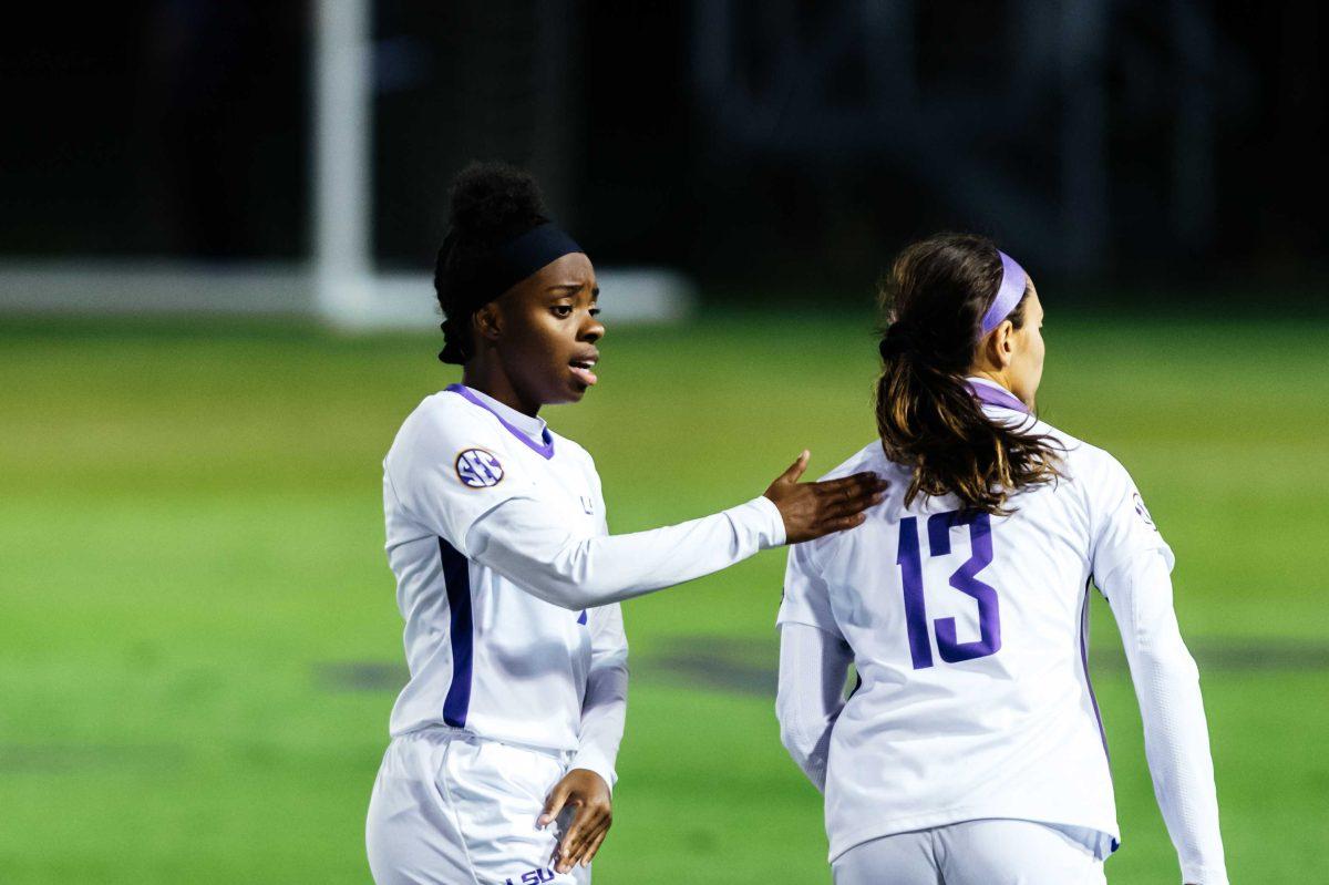 LSU soccer redshirt-junior forward Tinaya Alexander (11) pats redshirt-freshman forward Taylor Dobles (13) on the back Friday, Oct. 30, 2020 during LSU's 0-2 loss to Vanderbilt at the LSU Soccer Stadium on W Lakeshore Drive.