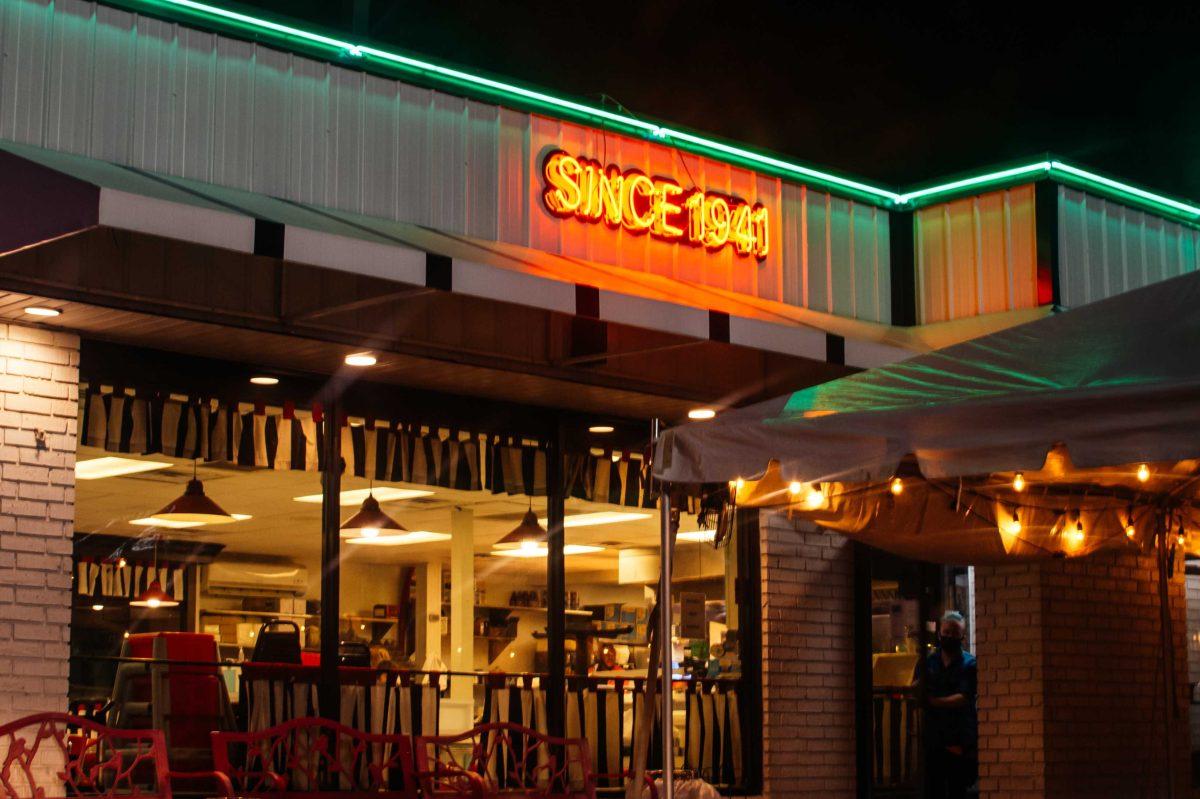 Louie's Cafe signs shine bright Saturday, Sept. 19, 2020 on Lake Street near LSU's campus.