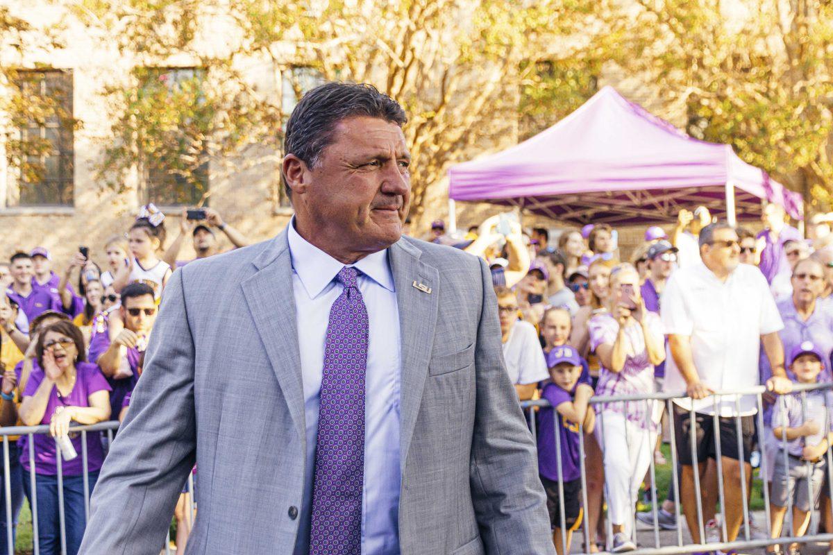 Coach O gets cheered on as he walks down Victory Hill before the Tigers' 42-6 win against Utah State on Saturday, October 5, 2019.