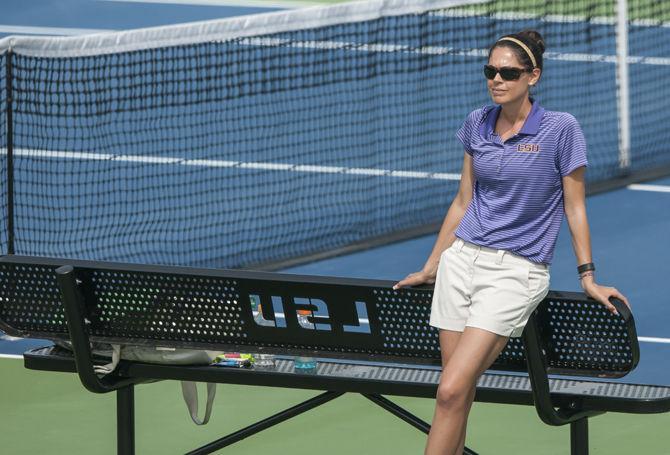 LSU co-head coach Julia Sell watches a match from the sidelines during the Tigers' 4-3 victory against Kentucky in the SEC Championship on Thursday, April 21, 2016 at the LSU Tennis Complex.