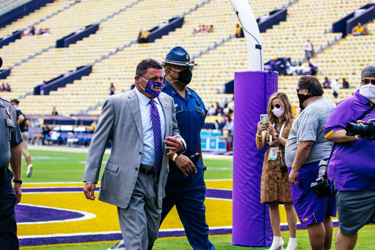 Coach Ed Orgeron walks towards the locker room Saturday, Sep. 26, 2020 before LSU's 44-34 loss against Mississippi State in Tiger Stadium.