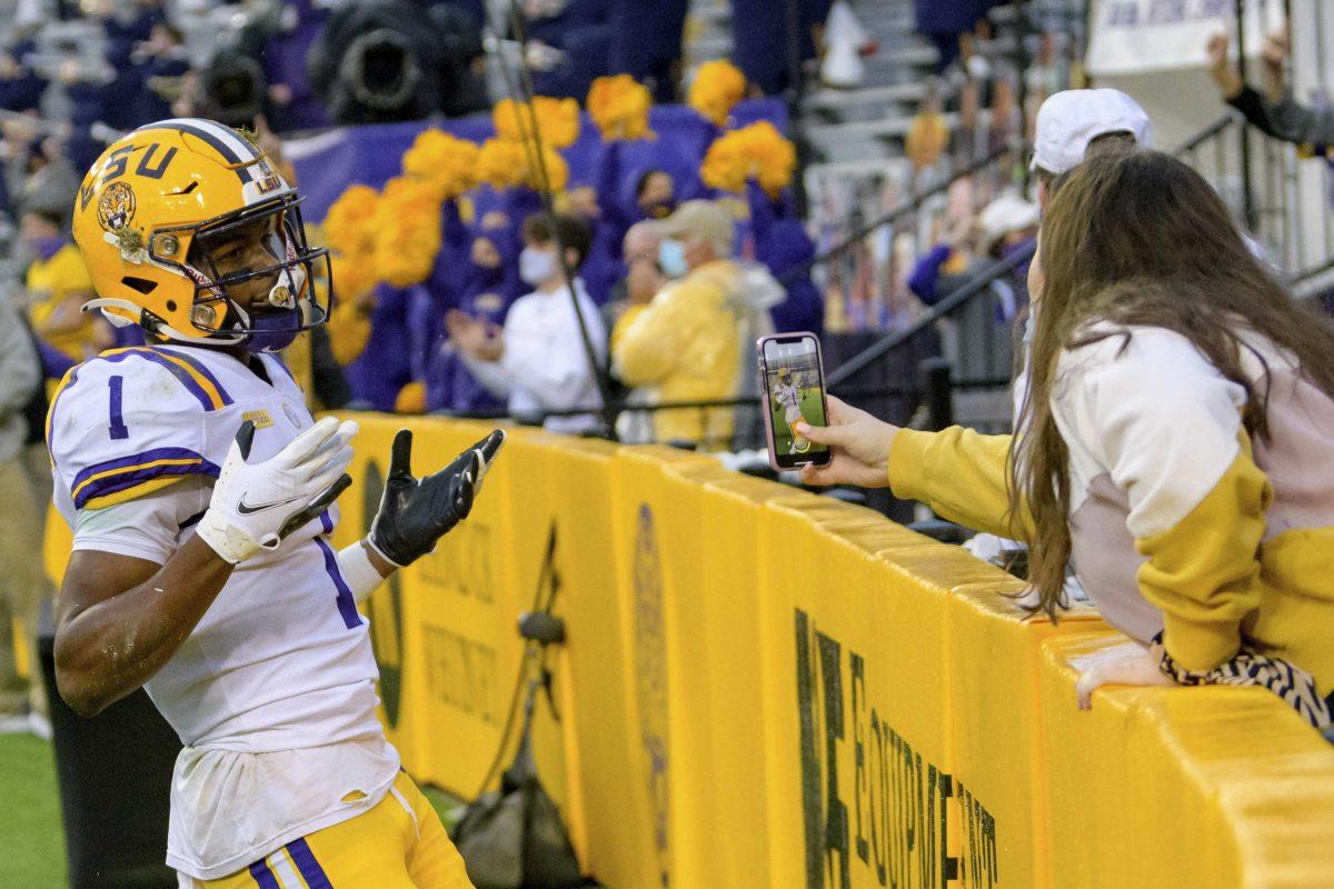 LSU wide receiver Kayshon Boutte (1) reacts after making a touchdown against Mississippi during the first half of an NCAA college football game in Baton Rouge, La., Saturday, Dec. 19, 2020. (AP Photo/Matthew Hinton)