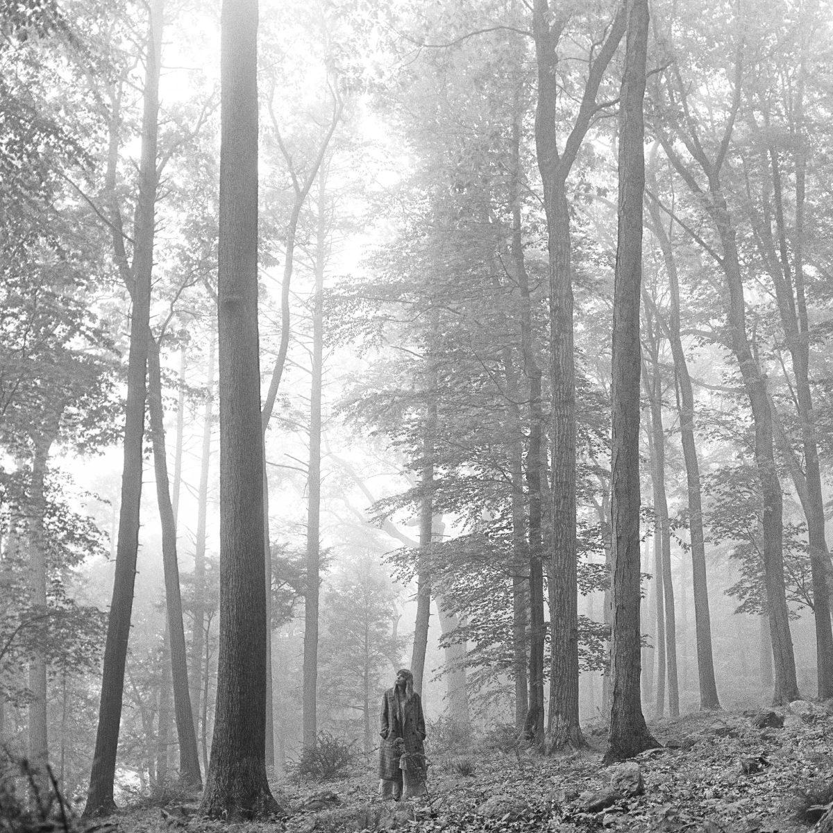 This cover image released by Republic Records shows &#8220;Folklore," the eighth record by Taylor Swift. Swift says the standard edition, available Friday, will include 16 tracks and the album will feature Bon Iver, Aaron Dessner of The National and frequent collaborator Jack Antonoff. (Republic Records via AP)