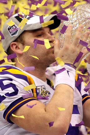 <p>Former quarterback Matt Flynn kisses the crystal ball after LSU’s Jan. 7, 2008, BCS National Championship victory against Ohio State.</p>