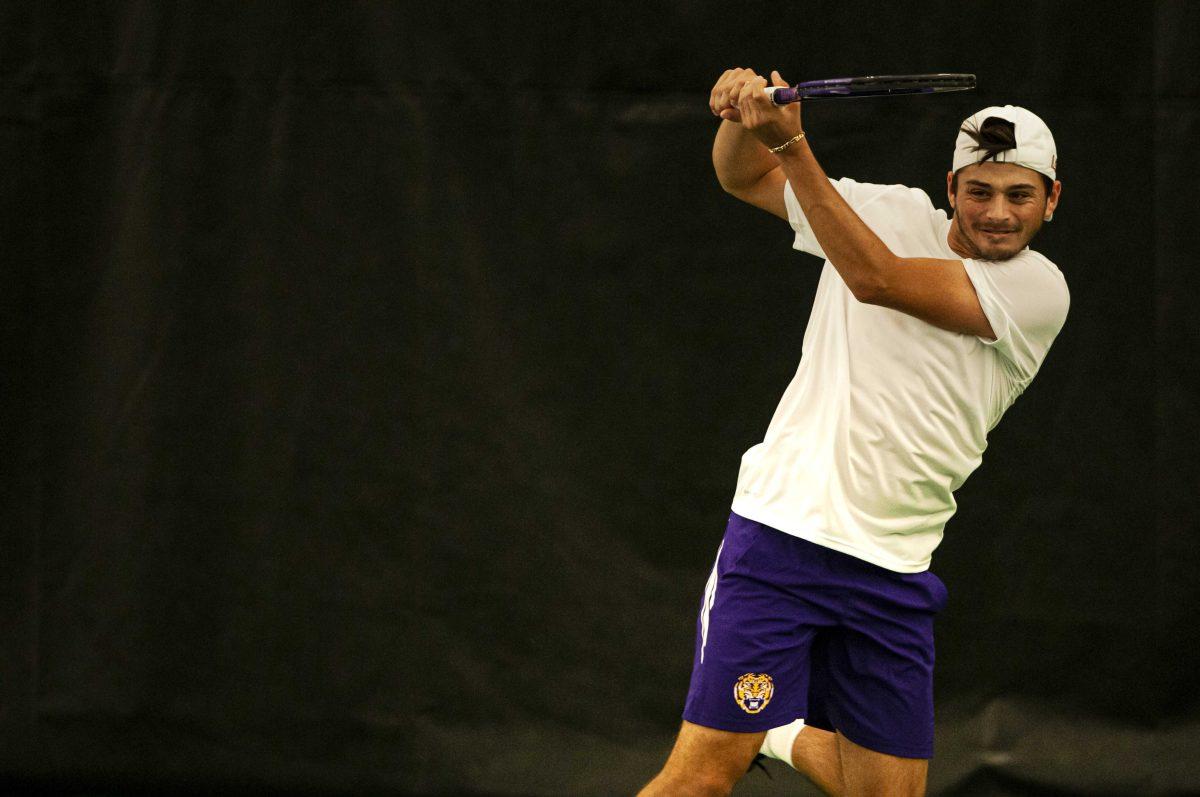 LSU men's tennis redshirt-freshman Ronald Hohmann prepares to hit on Saturday, Jan. 23, 2021 before LSU's 5-2 victory against UTSA in the LSU Tennis Complex&#160;on Gourrier Avenue in Baton Rouge, La.