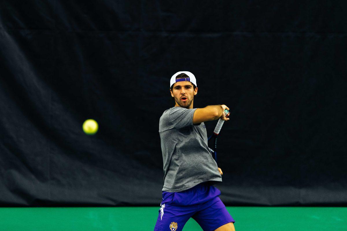 LSU men's tennis redshirt-junior Malik Bhatnagar gets ready to hit the ball Sunday, Jan. 17, 2021 during LSU's 7-0 win against Alcorn State in the LSU Tennis Complex on Gourrier Avenue in Baton Rouge, La.