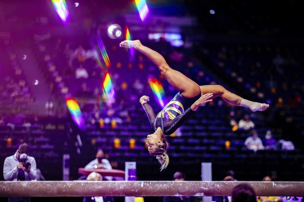 LSU gymnastics senior uneven bars, balance beam and floor Bridget Dean performs her beam routine Friday, Jan. 8, 2021 during No. 3 LSU gymnastics' 196.550-196.350 win against No. 15 Arkansas in the Pete Maravich Assembly Center on N Stadium Drive in Baton Rouge, La.