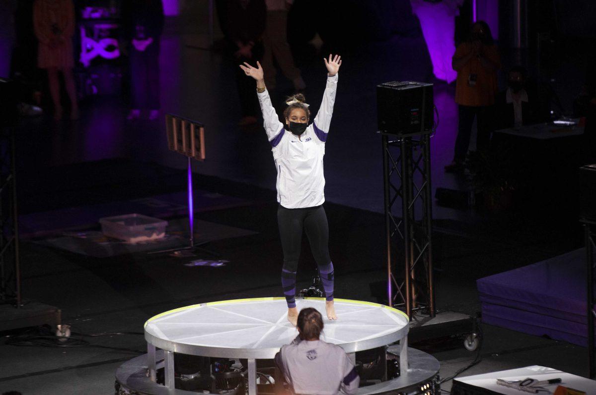 LSU gymnastics freshman all-around Haleigh Bryant waves to the crowd Friday, Jan. 23, 2021 during the Tiger&#8217;s 197.200-196.375 win against Georgia in the Pete Maravich Assembly Center.