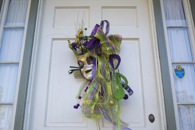 Baton Rouge residents display decorations to gear up for Mardi Gras on Tuesday, Jan. 30, 2018.