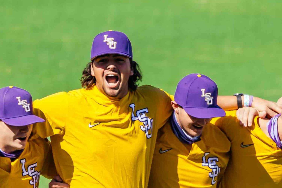 LSU baseball freshman right-handed pitcher Blake Money (44) sings the LSU fight song Wednesday, Sep. 30, 2020 during LSU baseball's first fall practice in Alex Box Stadium on Gourrier Avenue.