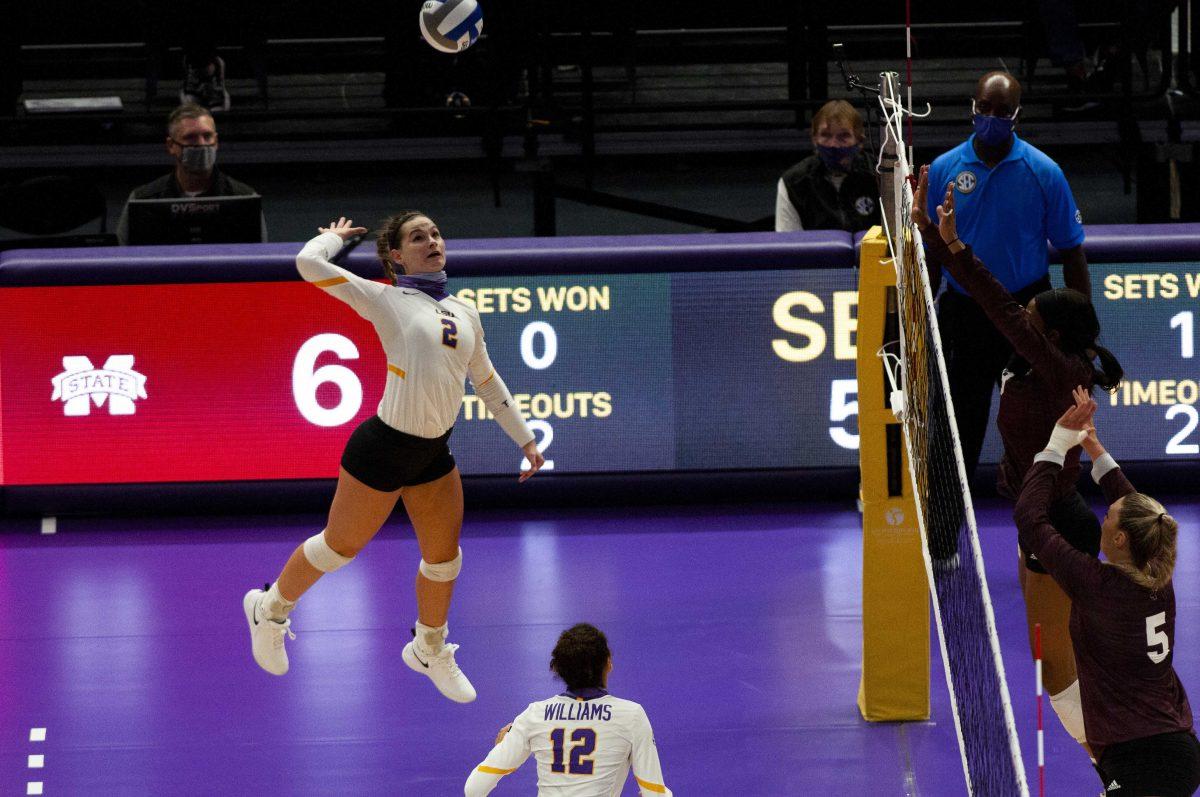 LSU volleyball freshman outside hitter Paige Flickinger (2) spikes the ball on Thursday, Oct. 22, 2020 during LSU volleyball's 3-1 win against Mississippi State at the Pete Maravich Assembly Center on N Stadium Center Drive.