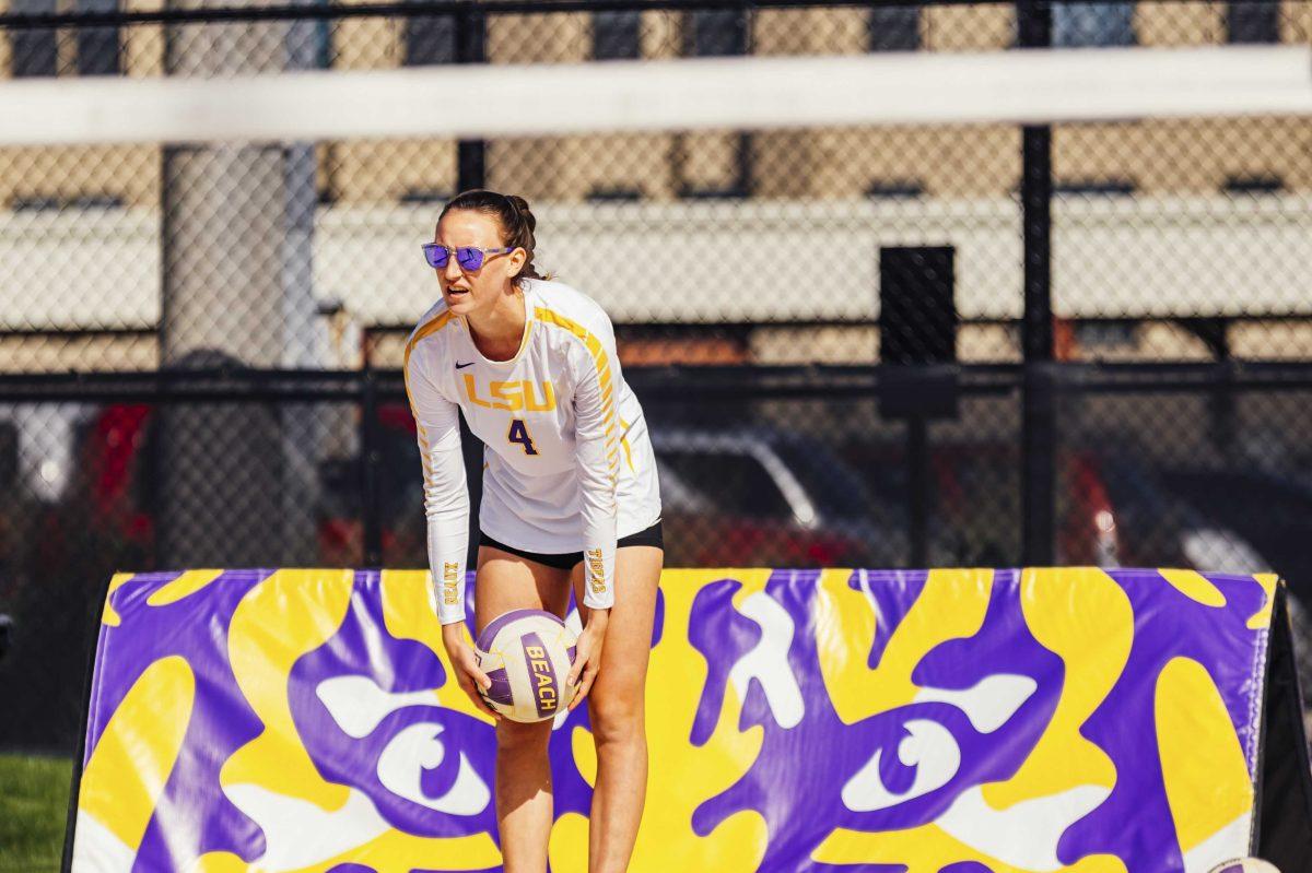 LSU beach volleyball sophomore Melia Lindner (4) gets ready to serve during the Purple vs. Gold scrimmage on Saturday, Feb. 15, 2020 at the Beach Volleyball Complex.