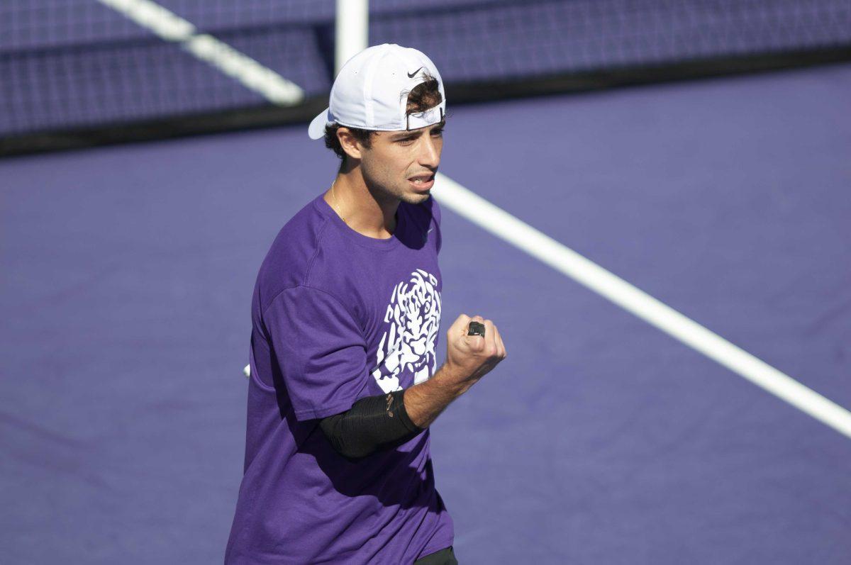 LSU men&#8217;s tennis redshirt junior Joey Thomas celebrates a point Sunday, Feb. 7, 2021 during LSU&#8217;s 2-5 loss against Tulane in the LSU Tennis Complex on Gourrier Avenue in Baton Rouge.