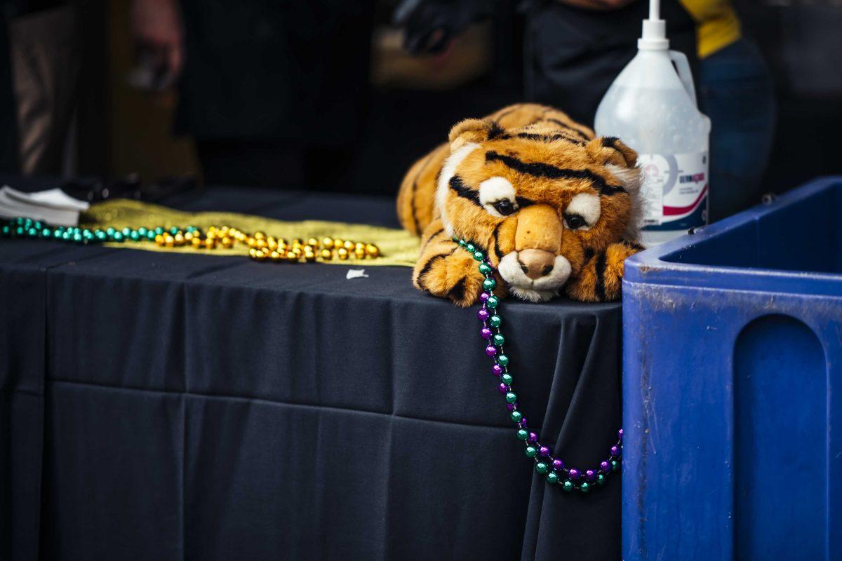 A tiger stuffed animal sits with beads around its neck Wednesday, Feb. 10, 2021 during the LSU Student Activities Board Mardi Gras Mambo event in front of the Student Union on LSU's campus in Baton Rouge, La.