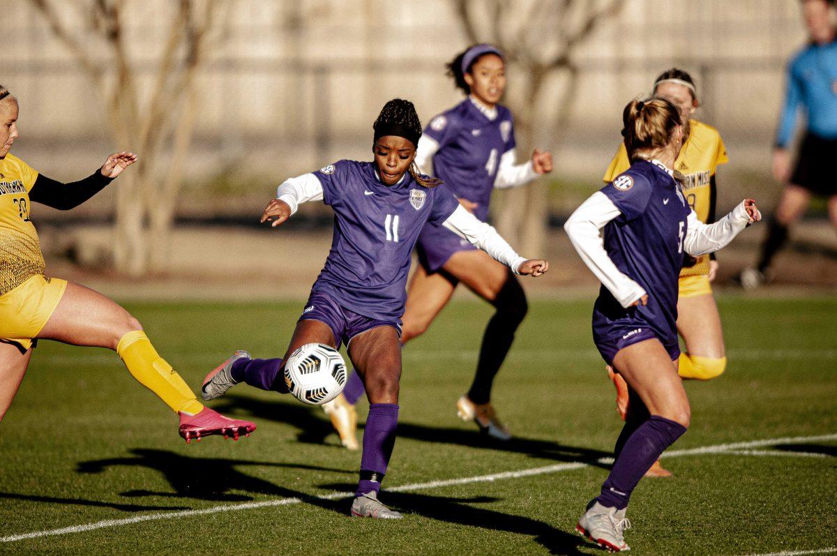 LSU soccer redshirt junior forward Tinaya Alexander (11) sprints with the ball on Saturday, Feb. 19, 2021 during LSU's 1-0 victory over Southern Miss at the LSU Soccer Stadium on W. Lakeshore Drive.