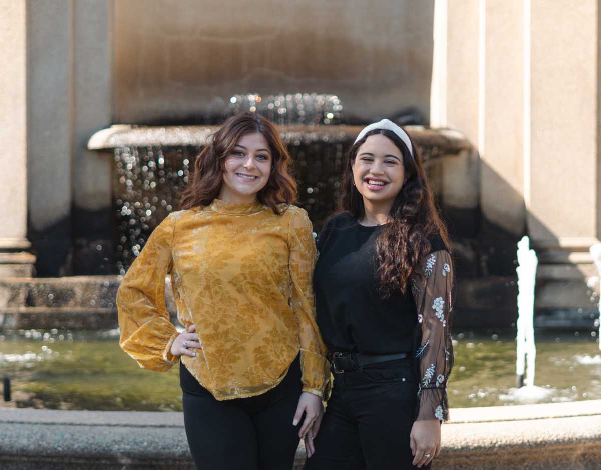 LSU juniors Mia LeJeune, a mass communications major, (left) and Angelina Cantelli, an English and psychology major, (right) pose on Jan. 18, 2021 in front of the Dodson Fountain in the Quad.