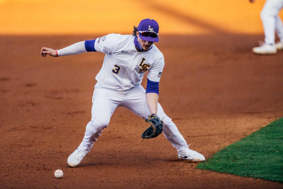 LSU baseball freshman infielder and outfielder Dylan Crews (3) retrieves the ball Friday, Jan. 29, 2021 during baseball white vs. gold media day at Alex Box Stadium on Gourrier Avenue in Baton Rouge, La.