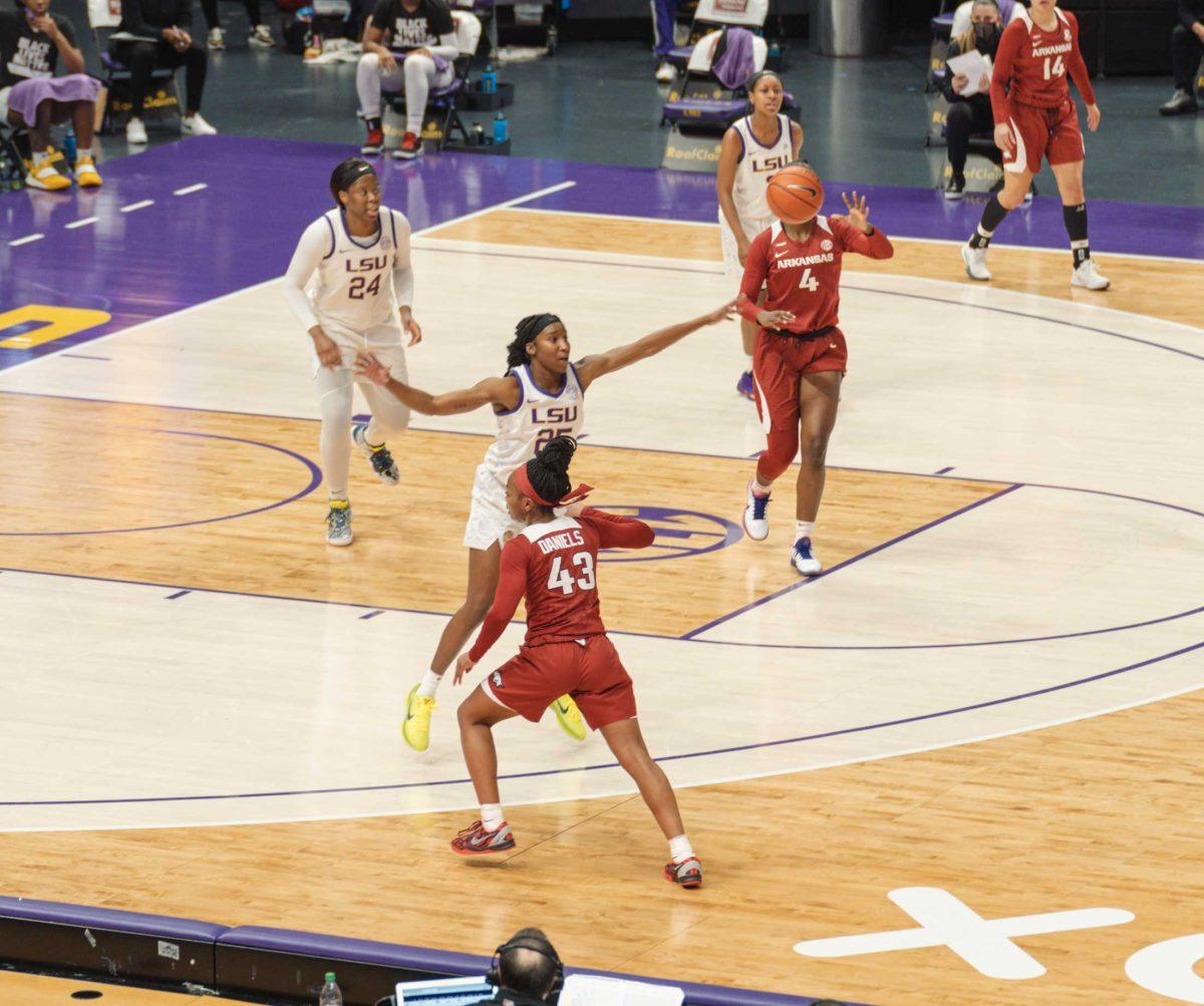 <p>LSU women’s basketball senior Rakell Spencer (25) tries to block a pass on Feb. 21, 2021 during LSU’s 64-74 loss against Arkansas in in the Pete Maravich Assembly Center on N Stadium Dr.</p>