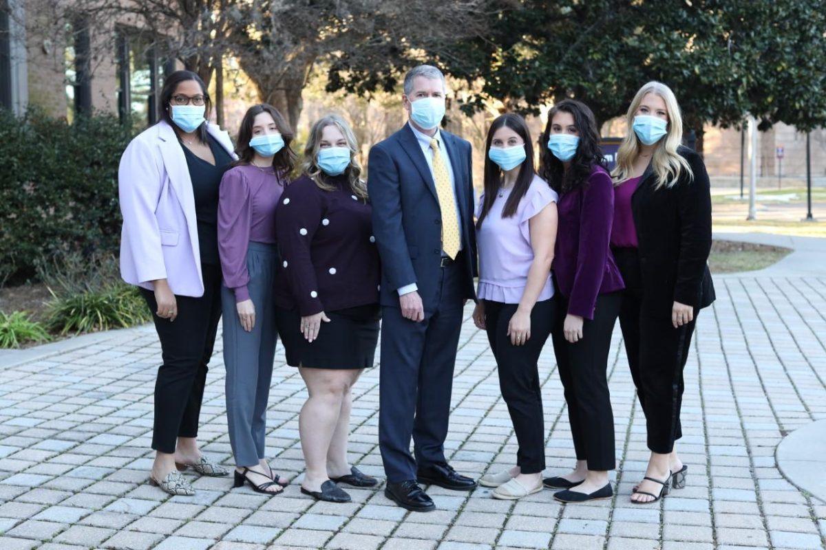 Faculty advisor Doug Draper with Manship students Mary Coll, Caylee Deshotel, Jordan Klemm, Gabie Debruler, Natalie Marse and Madelyn Ybarzabal.&#160;