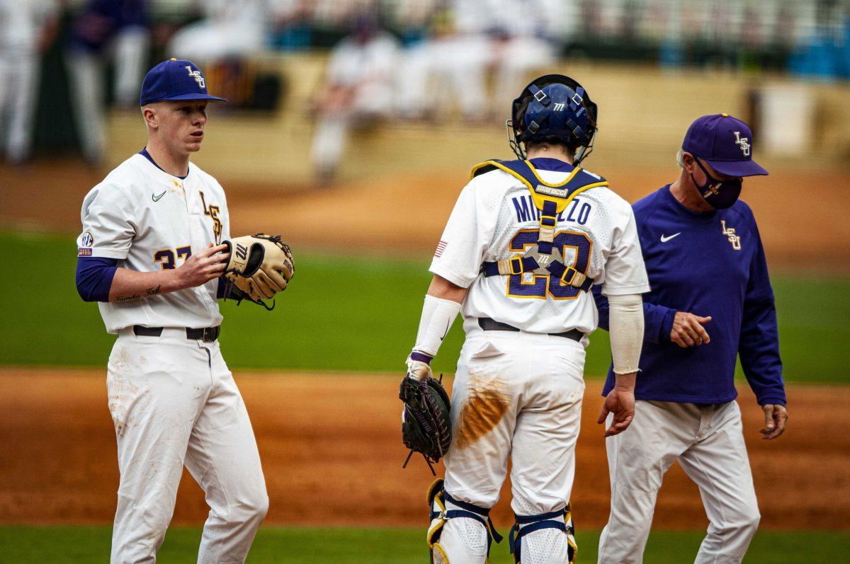 LSU baseball head coach Paul Mainieri speaks with players Friday, March 5, 2021 during LSU's loss 22-7 loss against Oral Roberts at Alex Box Stadium on Gourrier Avenue in Baton Rouge, La.