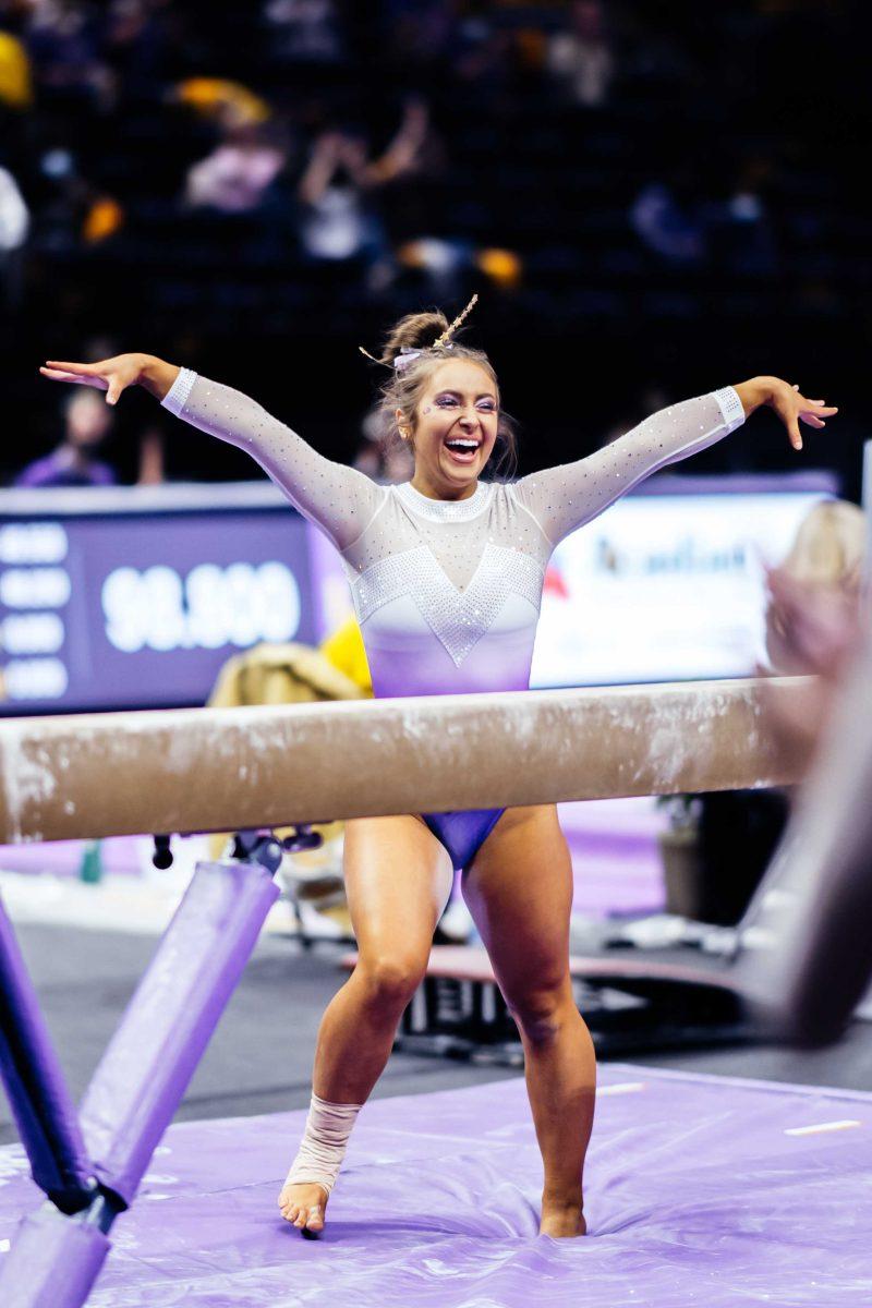 LSU gymnastics senior balance beam and floor Christina Desiderio celebrates after her beam routine Friday, March 3, 2021 during LSU's 197.875-196.175 win over Missouri in the Pete Maravich Assembly Center on N. Stadium Drive in Baton Rouge, La.