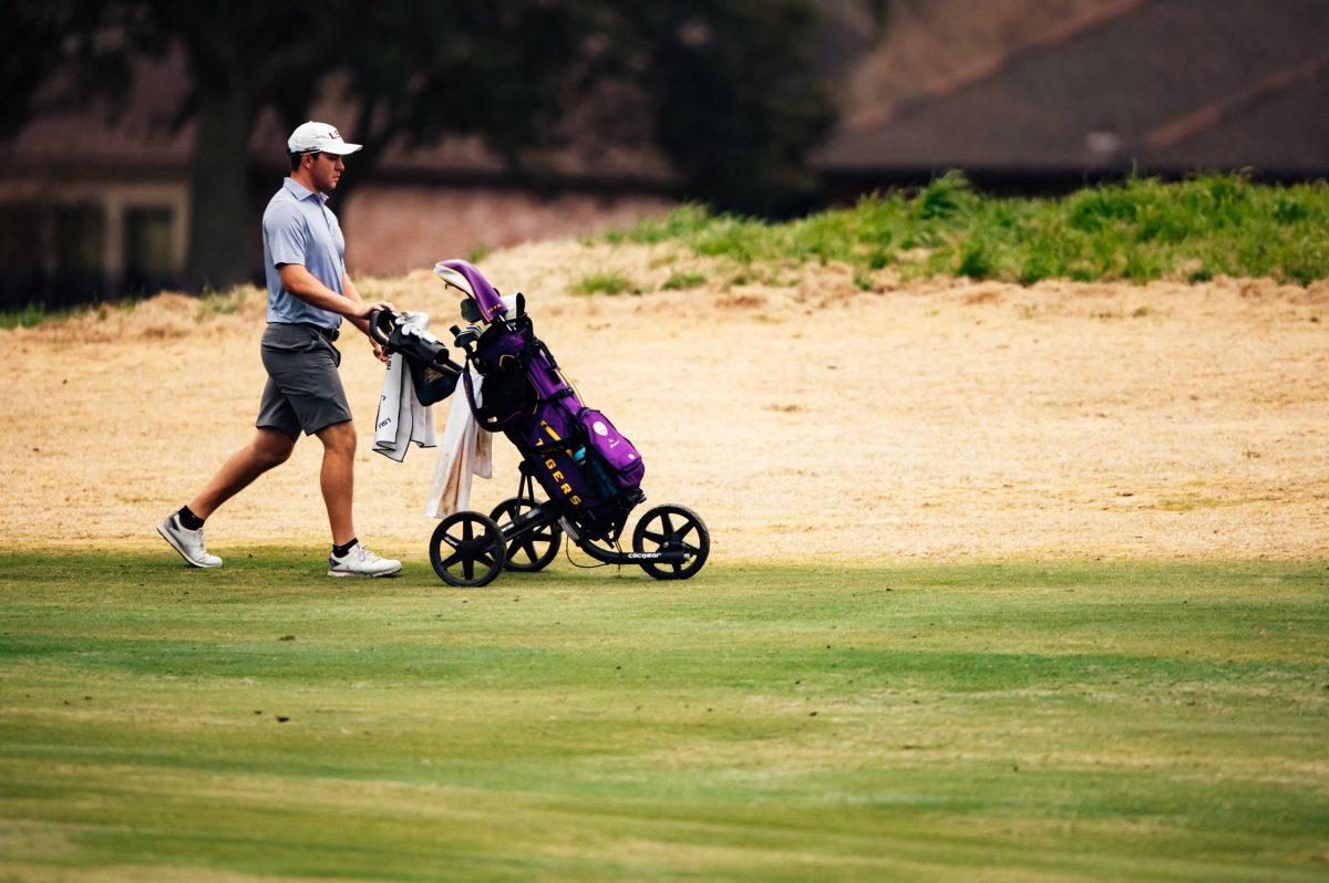 LSU men's golf junior Trey Winstead moves his caddy to the end of the first hole Friday, Feb. 26, 2021 during the LSU Invitational hosted at the University Club on Memorial Tower Drive in Baton Rouge, La.