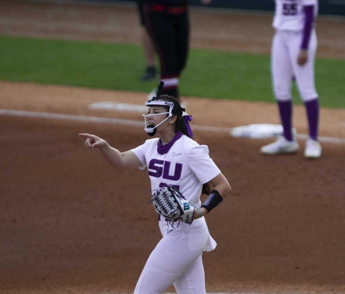 <p>LSU softball junior pitcher Shelbi Sunseri (27) celebrates her teammates catch Saturday, Feb. 27, 2021 during LSU's 3-2 win over UL-Lafayette at Tiger Park on Skip Bertman Drive in Baton Rouge.</p>