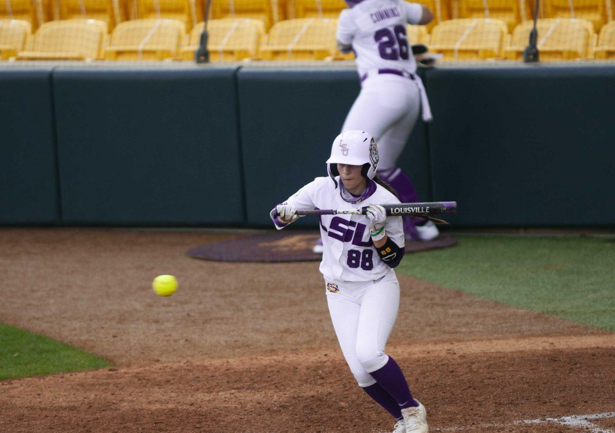 LSU softball freshman outfielder Ciara Briggs (88) bunts the ball Saturday, Feb. 27, 2021 during LSU's 3-2 win over UL-Lafayette at Tiger Park on Skip Bertman Drive in Baton Rouge.